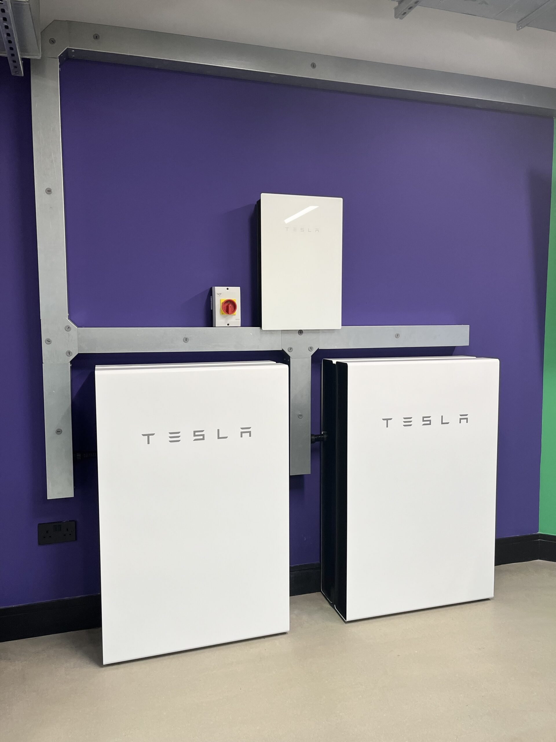 Tesla powerwall at Lochlie Construction offices in Hillington